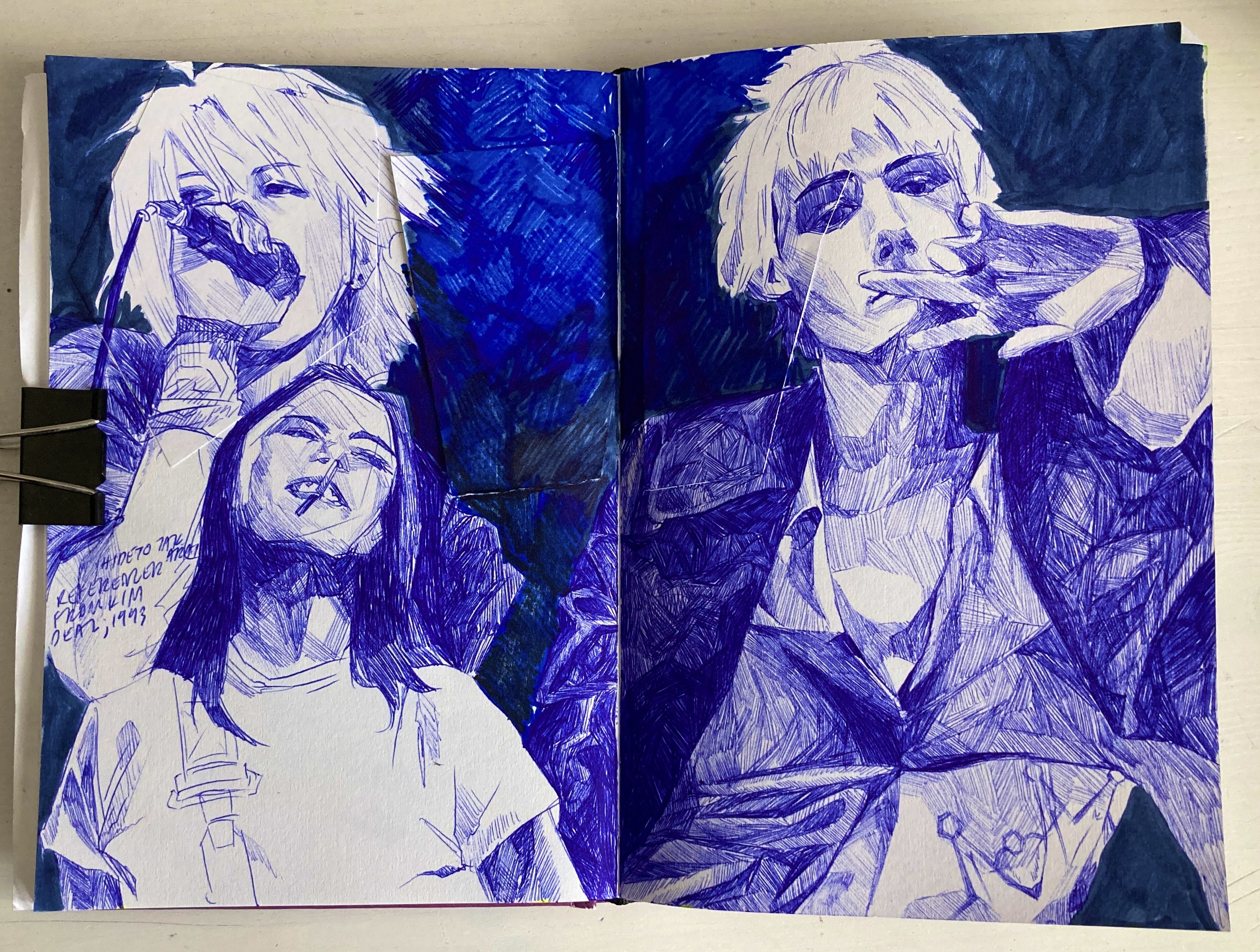 A drawing of three singers in blue pen.